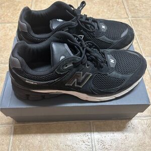New Balance 2002R Black and Gray Mesh Sneakers